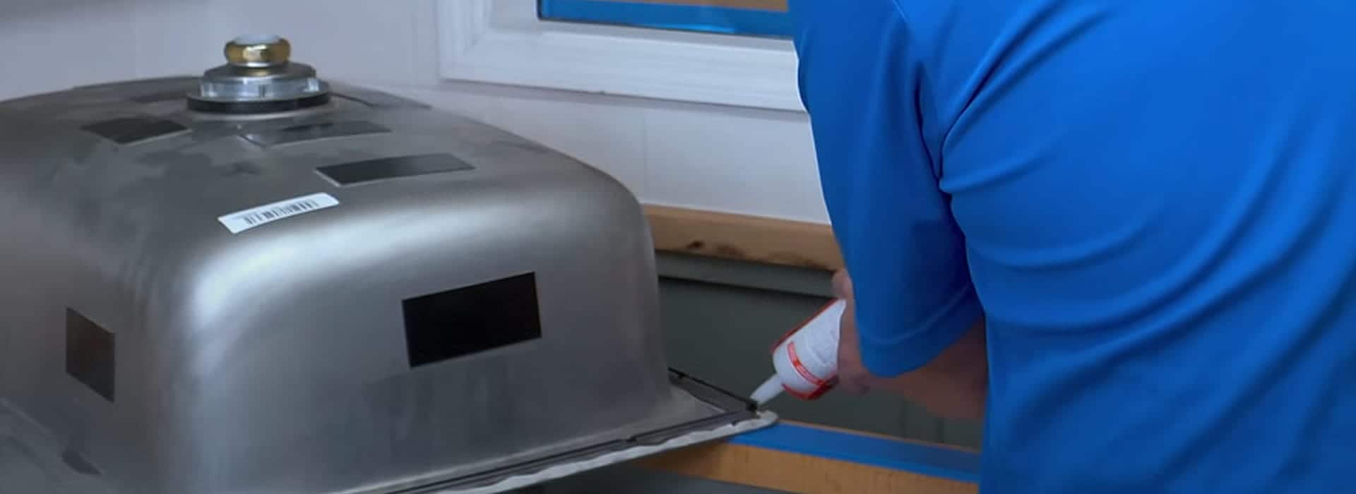 Apply a bead of silicone caulk around the countertop Apply a bead of silicone caulk around the countertop