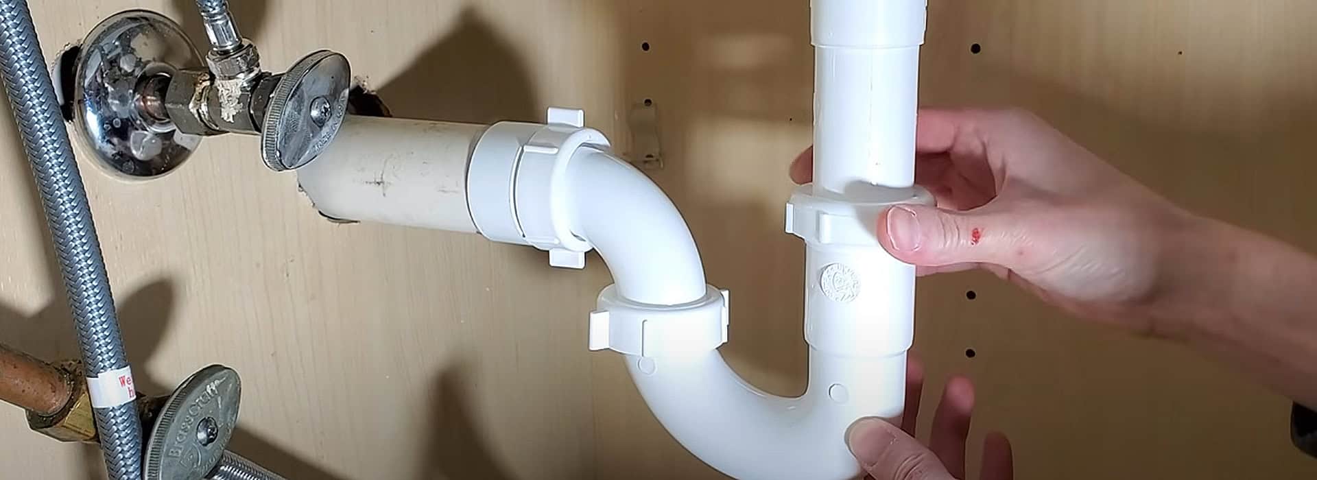Install kitchen sink – Reinstall the P-Trap Install kitchen sink - Reinstall the P-Trap