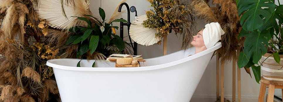 a beautiful young woman taking bath in a room full with plants a beautiful young woman taking bath in a room full with plants