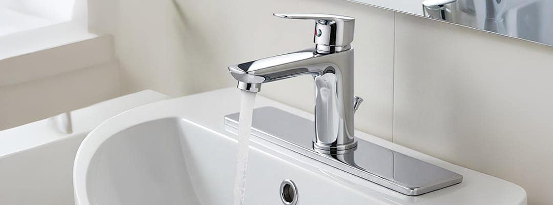Chrome bathroom faucet with deck plate