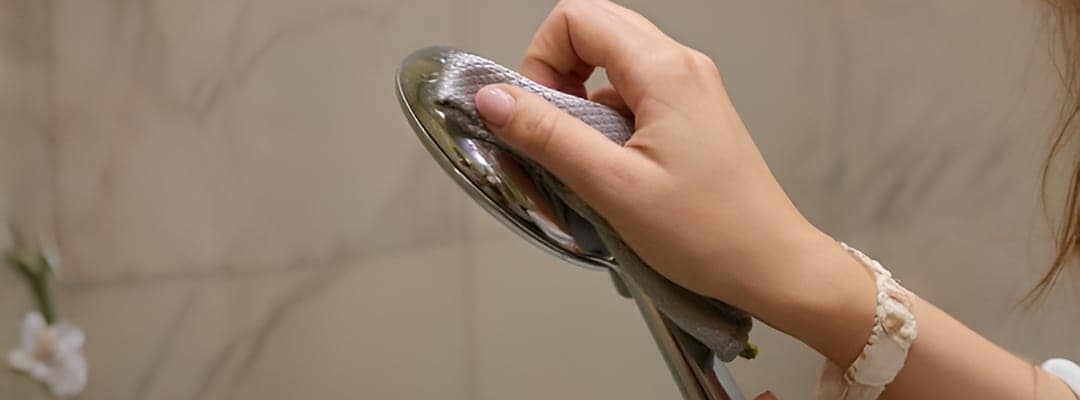 Clean your shower head regularly with a soft cloth Clean your shower head regularly with a soft cloth