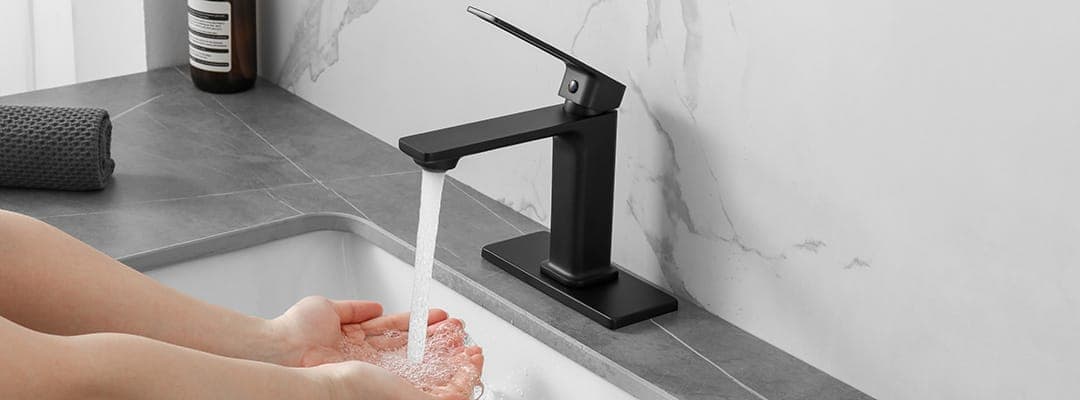 Matte black bathroom faucet with deck plate Matte black bathroom faucet with deck plate