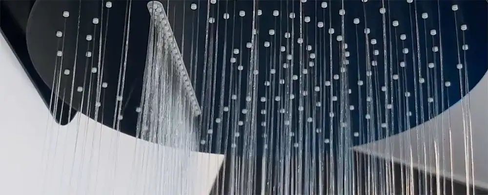 OEM showerhead featuring air-injection technology and custom flow restrictors for EPA WaterSense and California CEC compliance.