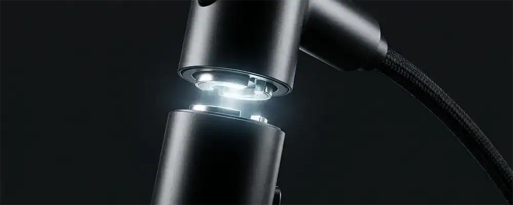 Close up of a premium matte black kitchen faucet magnetic docking spray head