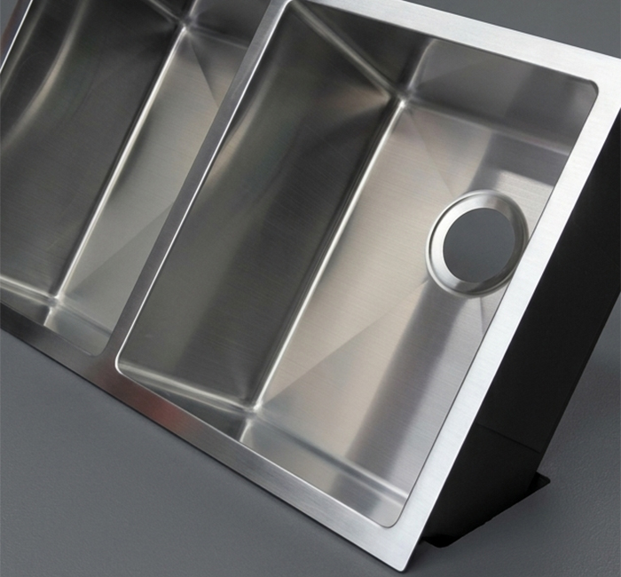 Kitchen sink material and surface