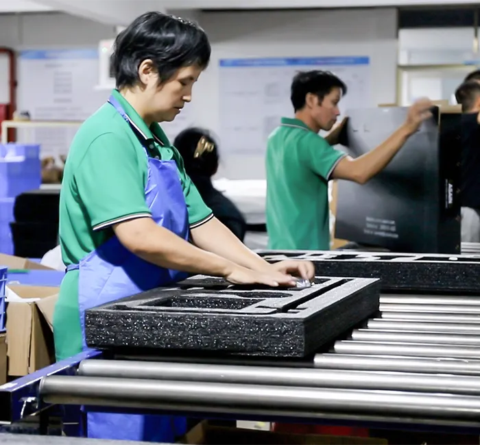 Packed faucet cartons checked before shipment release